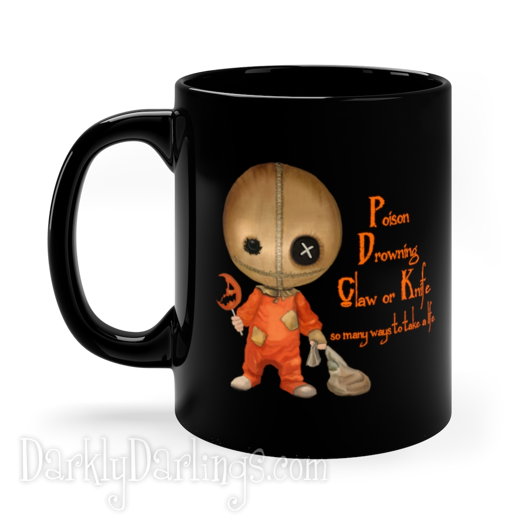 Sam from Trick R treat on a coffee mug with quote: "Poison, drowning, claw or knife, so many ways to take a life"